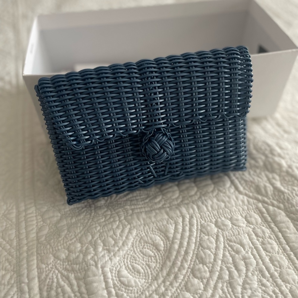 The Linley Line Cornflower Blue Woven Clutch Bag
New Without Tags
